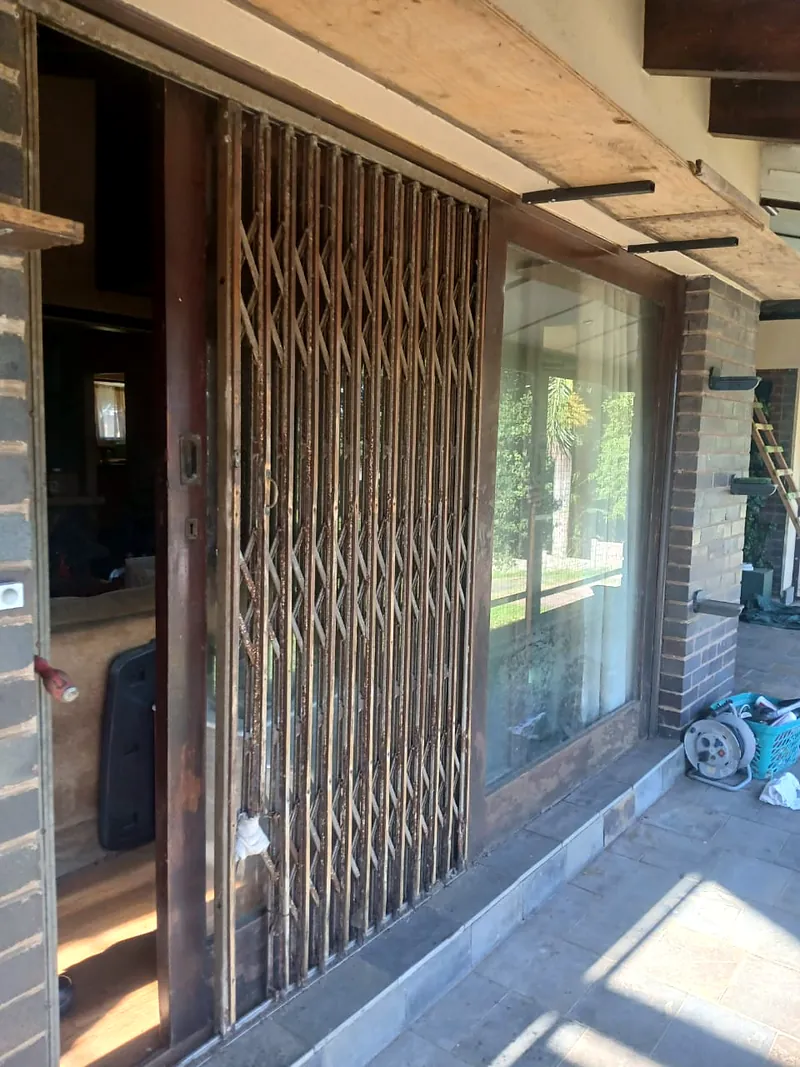 Trellidor security gate across a patio sliding door